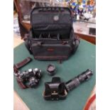 A Pullman camera bag containing cased Zenit TTL camera with lens together withg three other