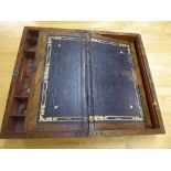 A 19th century rosewood and brass bound writing slope.
