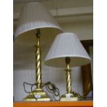 Two brass twist column table lamps with shades