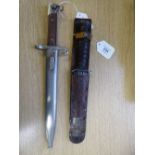 A bayonet in leather sheath stamped "US M3 Imperial",