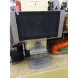 A Sony WGEA 37" LCD TV on stand together with a Goodmans DVD player