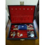A contemporary leather jewellery box containing cameo brooch, Victorian style brooch,