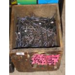 Pine box containing 4'' nails