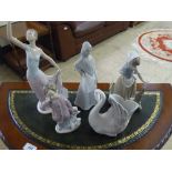 A male figurine dancer together with a Nao figurine of a swan, Nao figurine, Girl with Butterfly,