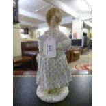 A Royal Worcester figurine : "Walking out Dresses of the Nineteenth century". No.18.