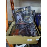 A collection of Lord of the Rings Collectors Magazines with plastic building kits together with