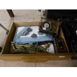 A box containing Freemasons aprons, a brass cased anniversary clock, ornamental brass bus,