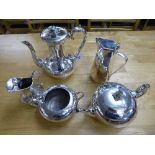 An ornate four piece silver plated tea service,