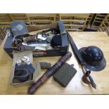 Box containing WWII period respirator mask, helmet, water bottles, webbing,