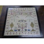 A Victorian framed sampler