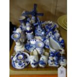 A tray containing a quantity of blue and white delft china including windmills, clogs etc.