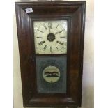 Early twentieth century American wall clock with pendulum and weights