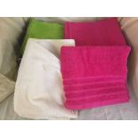 Two boxes of assorted towels and bath mats