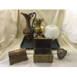 A tray of copper oil lamp with glass shade, small brass table casket, inlaid jewellery box,