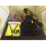 A box of four pairs of work boots, Hi-viz vests,