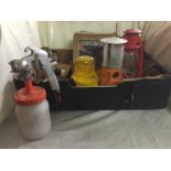 A box of Optimus blow torch, paraffin lamps,