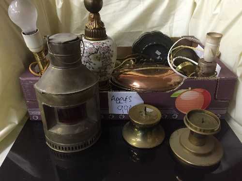 A box of brass ship's style lamp, copper pans, brass candlesticks,
