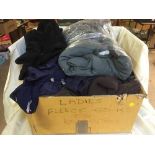 A box of rain jackets, coats,