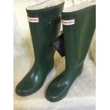 A pair of green Hunter wellingtons size 7