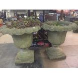 A pair of stone garden planters