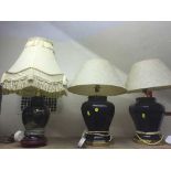 Three black china table lamps