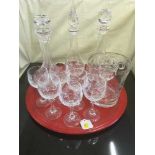 A tray of set of seven crystal wine glasses, ice bucket,