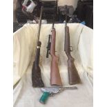 A box of ammunition crate, two air rifles, Gat air pistol,