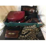 A crate of Estee Lauder gift set in case, lady's handbag,