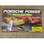 A boxed Scalextric Porsche Power racing set