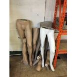 A large quantity of mannequin legs and arms