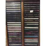 Two contemporary CD racks and a large quantity of CDs - Mile Davis,