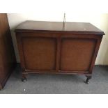 An oak blanket box and a walnut d-shaped table