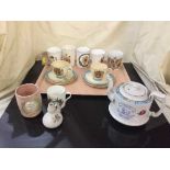 A tray of Walker Co-op Society Diamond Jubilee teapot, two Clarice Cliff commemorative trios,