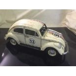 A tin plated motorcar - Beetle