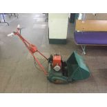 A Suffolk Punch petrol mower