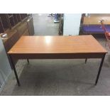 A teak effect office table