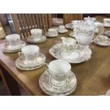 A Coalport Allegro cream and gilt china tea set