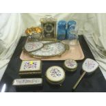 A tray of dressing table brush set, storage jars, candle holders,