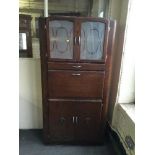 A 1950's oak kitchen cabinet