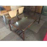 A mahogany coffee table with brass mounts