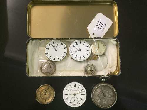 A silver pocket watch together with a quantity of watch movements (Q)