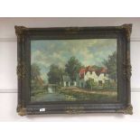 Continental school : A view along a canal with houses beyond, oil on canvas, indistincly signed,