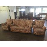 An Ercol three piece lounge suite