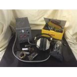 A box of assorted radio bulbs and fittings, headphones,