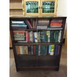 A set of glass door bookshelves