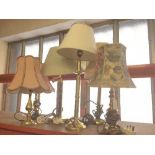 Six assorted brass table lamps with shades