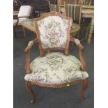 A walnut framed tapestry armchair