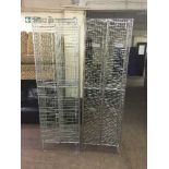 Two four door metal cage lockers