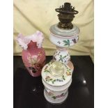 A Victorian hand painted glass oil lamp,