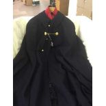 A naval cape together with a dress jacket